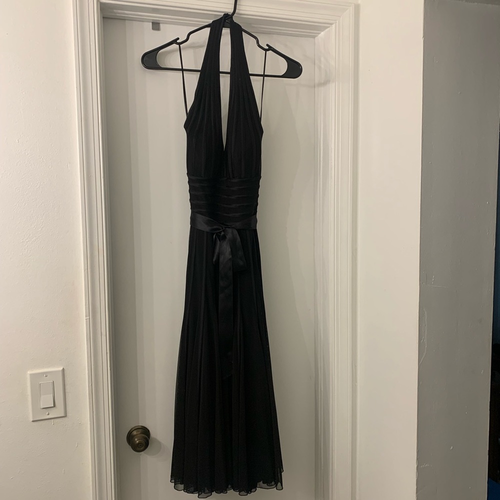 This is the beautiful Black halter dress that will have heads turning. 🥰